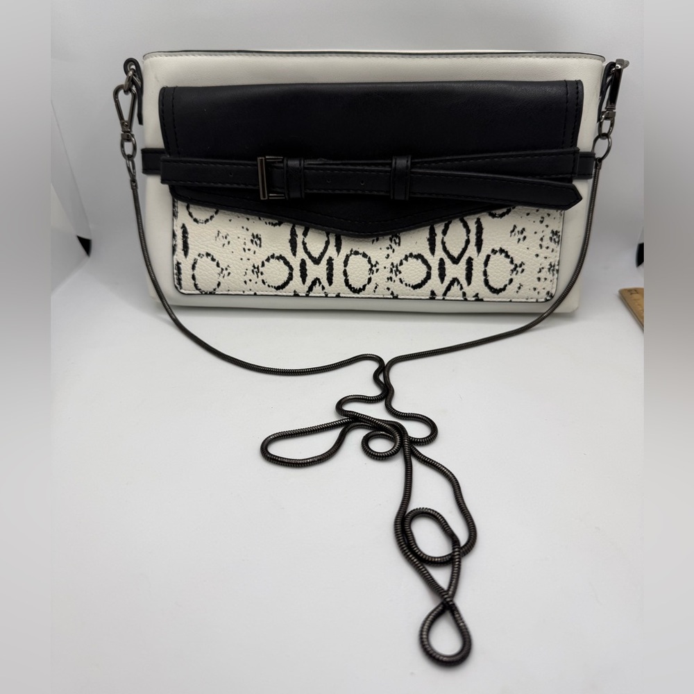 Reed Crossbody Purse Clutch featuring a removable metal chain strap Animal Print